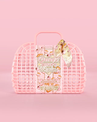 Rózsaszín gofri-stílusú boo kosár, benne egy termékkel, rózsaszín alapon