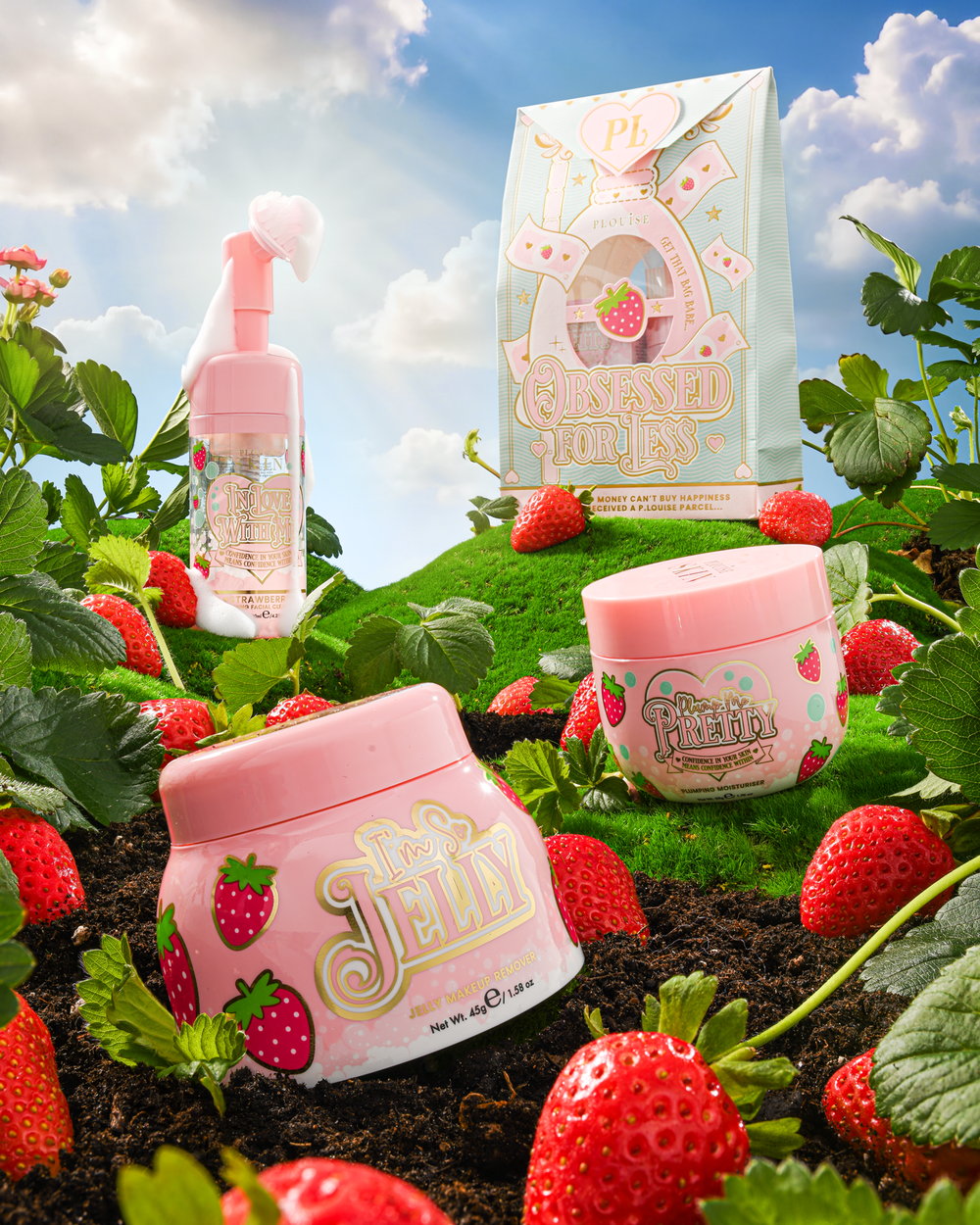 P. Louise Strawberry Obsessed for Kevesebb dupla tisztítás és hidratálás bőrápoló készlet egy füves dombon, eperrel körülvéve