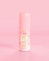 Rózsaszín üveg P.Louise Pure Intentions Purify & Brightening Lotion piros masni mintával rózsaszín háttéren