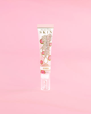 Tube of P. Louise Dose Of Dreams C vitaminos Brightening Eye Cream rózsaszín alapon