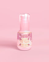 Rózsaszín üveg P. Louise Erase The Trace Dark Spot Correcting Serum, rózsaszín alapon